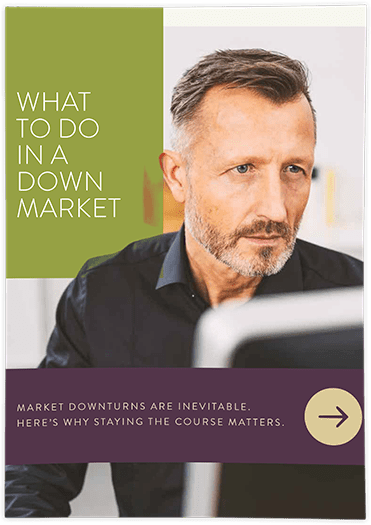 down-market-csrp The cover photo of the whitepaper "What to Do in a Down Market." The main photo is a man looking at a computer screen.